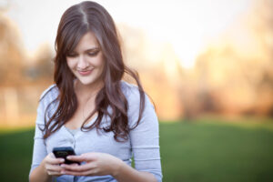 woman smiling because of her dating apps
