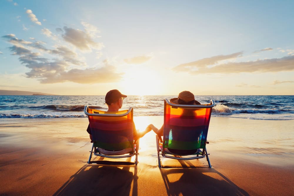Sober couple enjoying peaceful moment by the seaside together