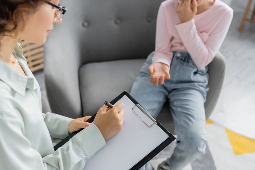 woman having a one to one addiction treatment about getting disciplined