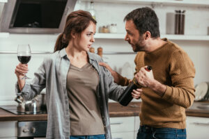 spouses fighter over getting an alcoholic drink