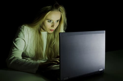 woman showing signs of internet addiction