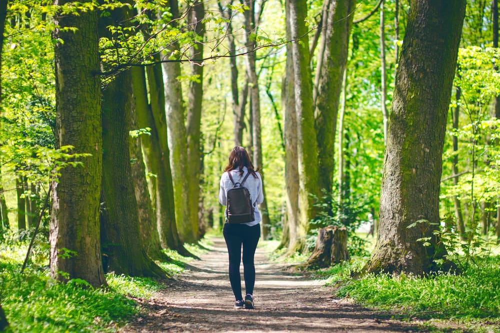 woman practicing mindfulness in nature