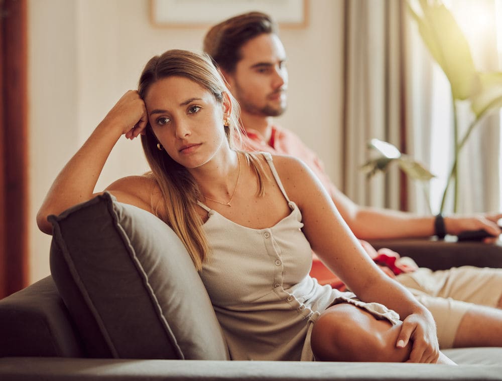 Worried woman wondering if her husband is an alcoholic
