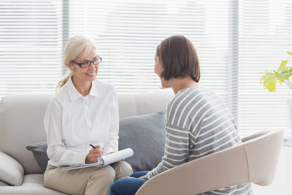 therapist and addicted patient talking to each other about boundaries