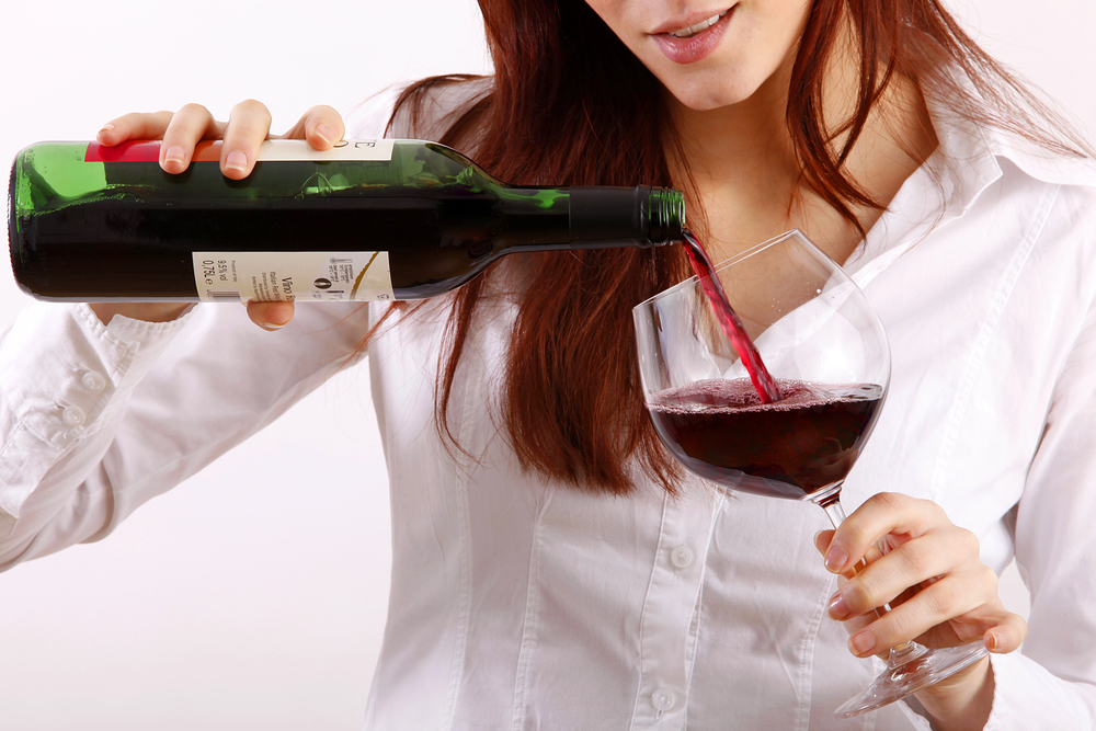 woman drinking wine occasionally