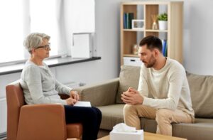 a man during therapy session with Psychologist