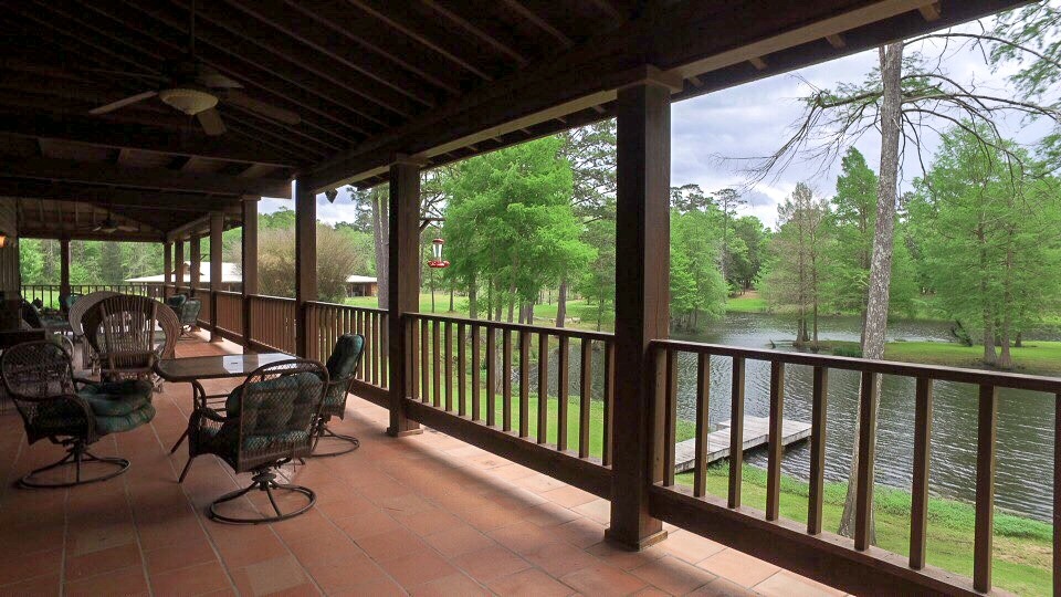Relaxing porch at addiction treatment Houston facility overlooking lake